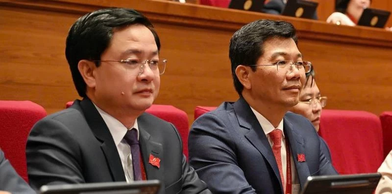 Bí thư Tỉnh ủy Tây Ninh Nguyễn Văn Quyết (trái) dự đại hội Đại hội đại biểu toàn quốc lần thứ XIV của Đảng