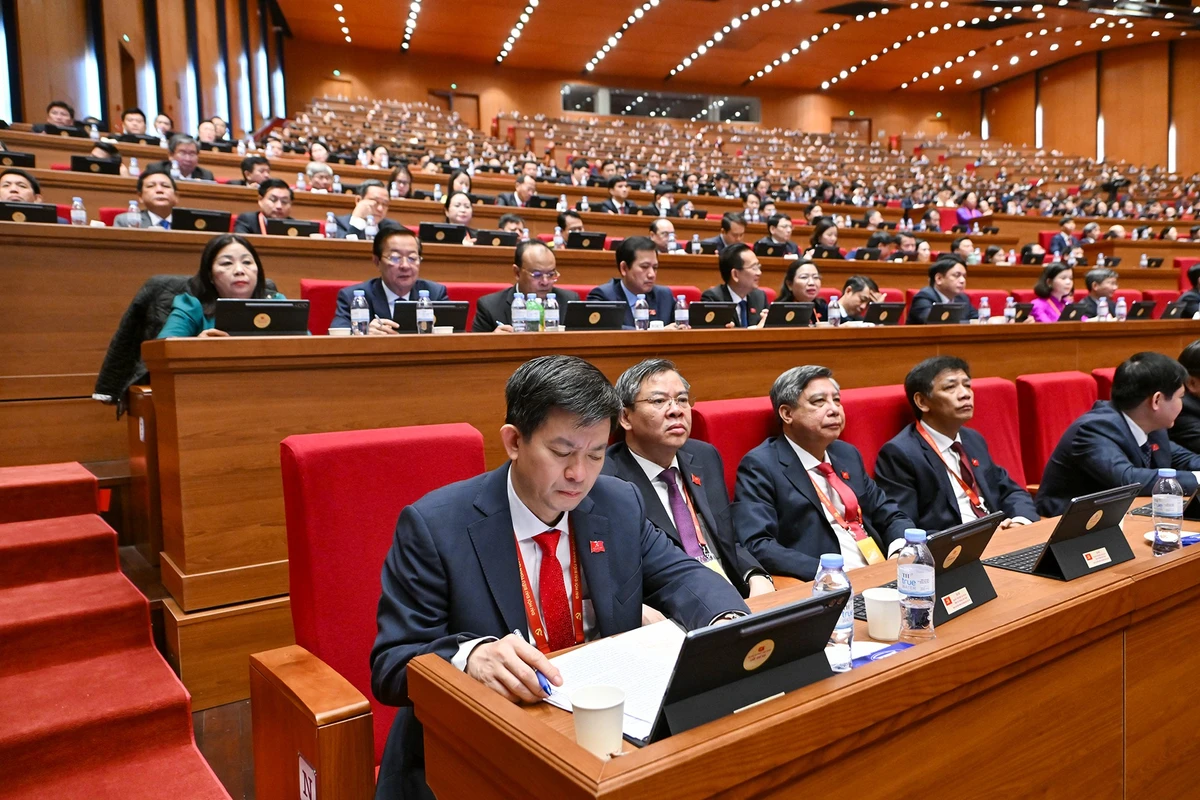 Các đại biểu tham dự phiên thảo luận tại hội trường về các văn kiện Đại hội XIV sáng 21/1.